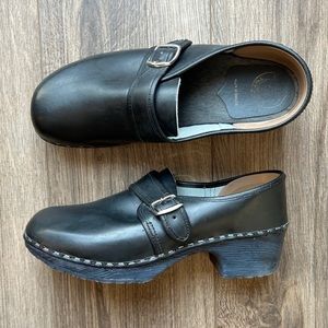 Stylish Black Leather Mules by [Brand]
